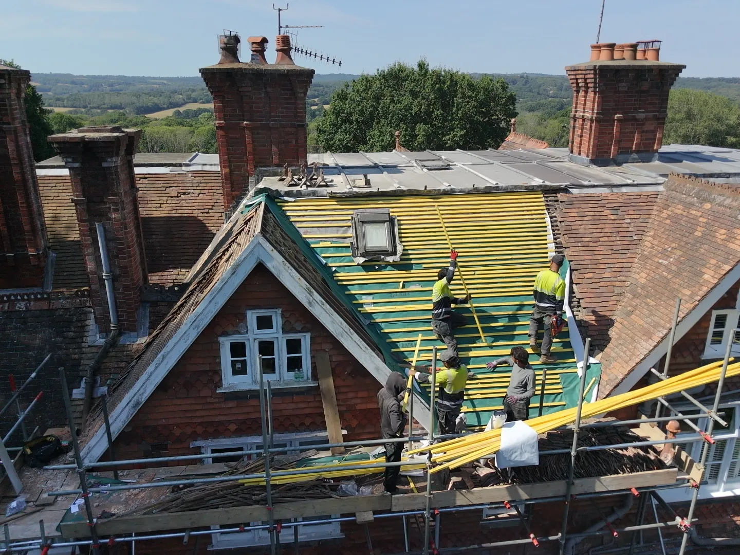 Westface team re-tiling a period roof